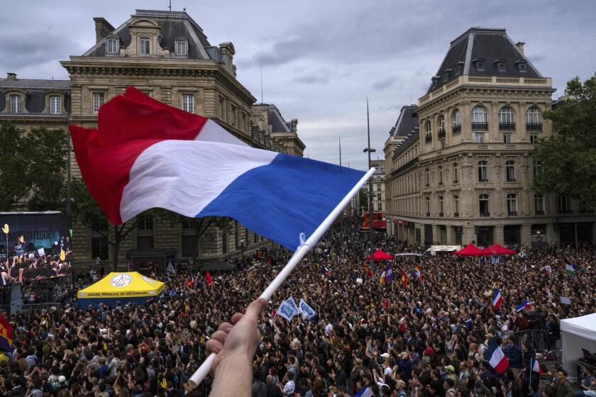 People gather at Republique plaza in a protest against the far-right, Wednesday, July 3, 2024.