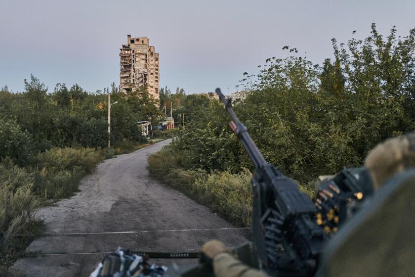 FILE - A Ukrainian soldier in his position in Avdiivka, Donetsk region, Ukraine, on Aug. 18, 2023. Russia is throwing more units into its effort to take this key eastern Ukraine city, Western analysts say, after apparent setbacks that have slowed its dayslong onslaught. The attempt to storm Avdiivka, a city that stands in the way of Moscow’s ambition of securing control of the entire Donetsk region, is Moscow’s most significant offensive operation in Ukraine since the start of the year, the U.K. defense ministry said Tuesday, Oct. 17, 2023. (AP Photo/Libkos)
