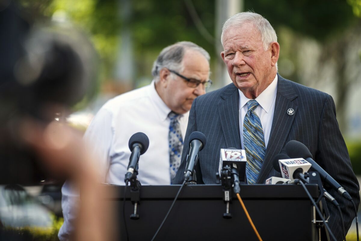 U.S. Marshal Marty Keely speaks regarding Vicky White, Lauderdale County Assistant Director of Corrections, and escaped inmate Casey White during a news conference outside of the Lauderdale County Courthouse in Florence, Ala., Monday, May 2, 2022. According to authorities, Casey White had a “special relationship” with jail official Vicky White, who authorities believe assisted in his escape. A manhunt was underway for Casey White, who was awaiting trial on a capital murder case, and Vicky White, after the pair vanished after leaving the Lauderdale County Detention Center, early Friday, April 29. The two are not related, authorities said. (Dan Busey/The TimesDaily via AP)