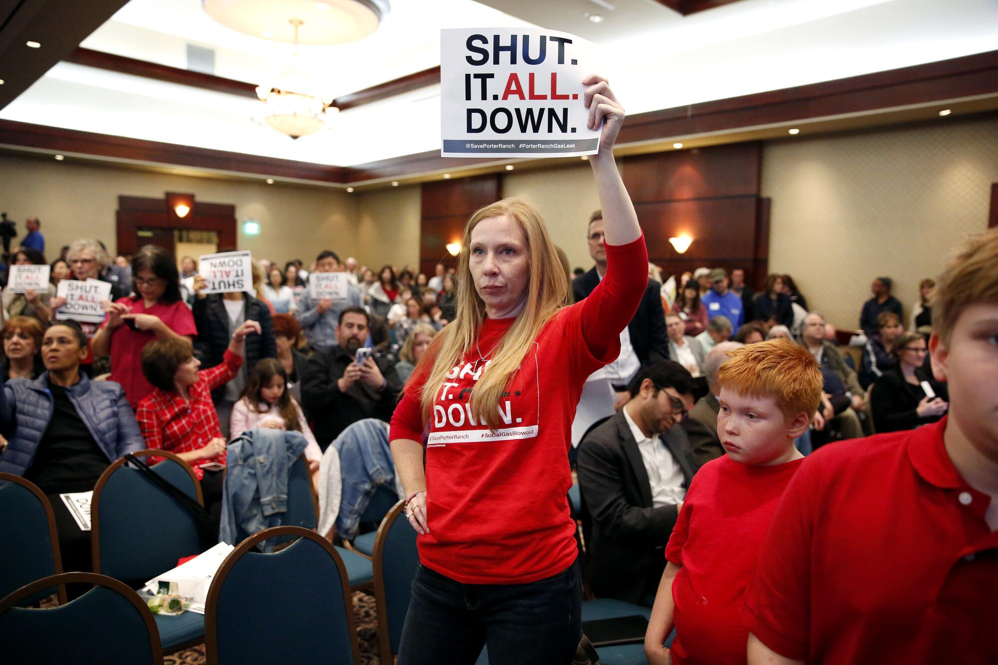 Danielle Michaels, a resident of Porter Ranch, attends a meeting held by state regulators in 2017.