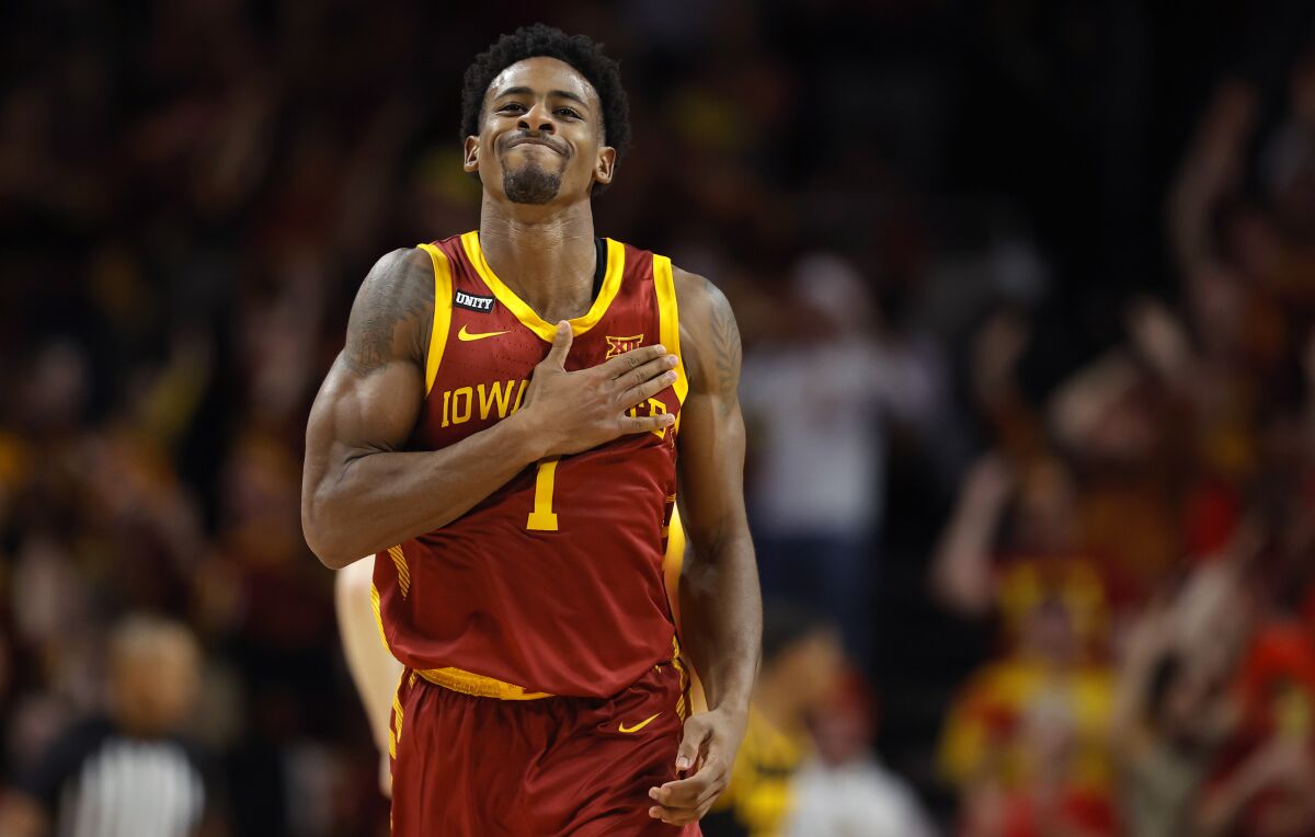 Iowa State guard Izaiah Brockington (1) celebrates after a 3-point basket during the first half of the team's NCAA college basketball game against Iowa, Thursday, Dec. 9, 2021, in Ames, Iowa. (AP Photo/Matthew Putney)