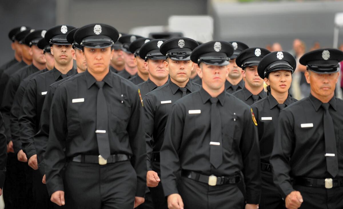 L.A. city firefighter graduates are seen in August. Mayor Eric Garcetti's overhaul of how the city hires new firefighters has so far failed to meet his aim of diversifying the LAFD.
