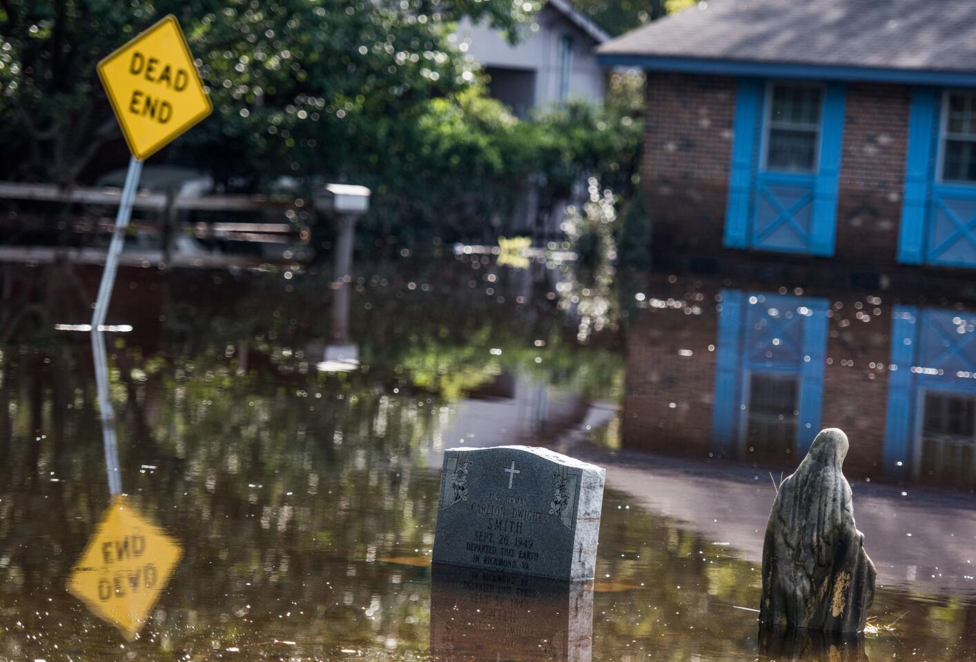 A graveyard is inundated with floodwaters from the Lumber River on Oct. 15, 2016 in Lumberton, North Carolina.