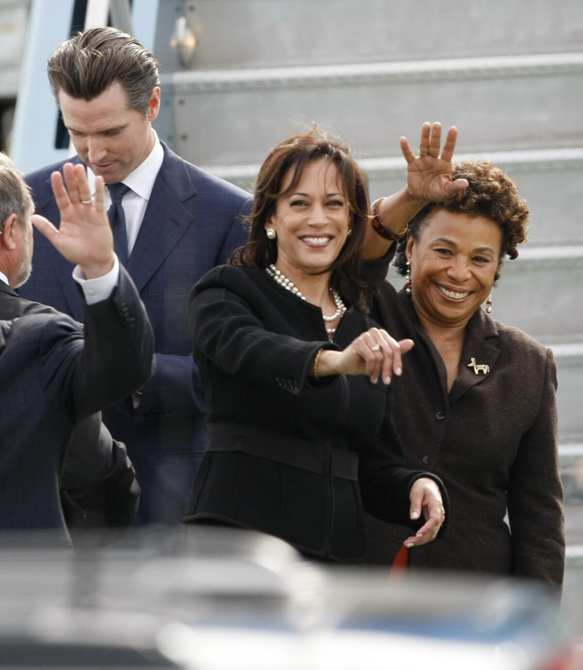 California Atty. Gen. Kamala Harris, center, has racked up a multi-million dollar campaign war chest for her re-election bid.