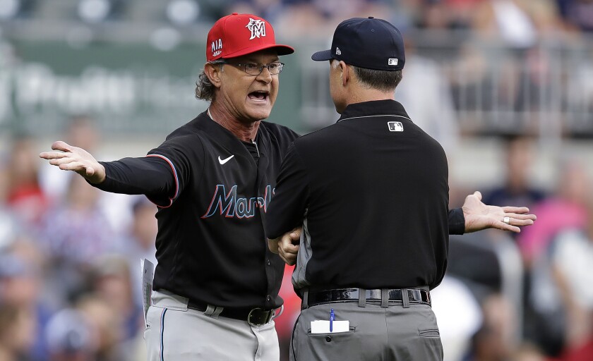 Miami Marlins manager Don Mattingly reacts after being ejected in the first inning of the team's baseball game against the Atlanta Braves on Friday, July 2, 2021, in Atlanta. (AP Photo/Ben Margot)