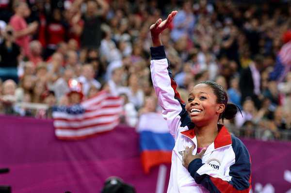 Gabrielle Douglas waves to the crowd after winning the gold medal in the women's individual all-around. She's just the fourth U.S. woman to win the title.