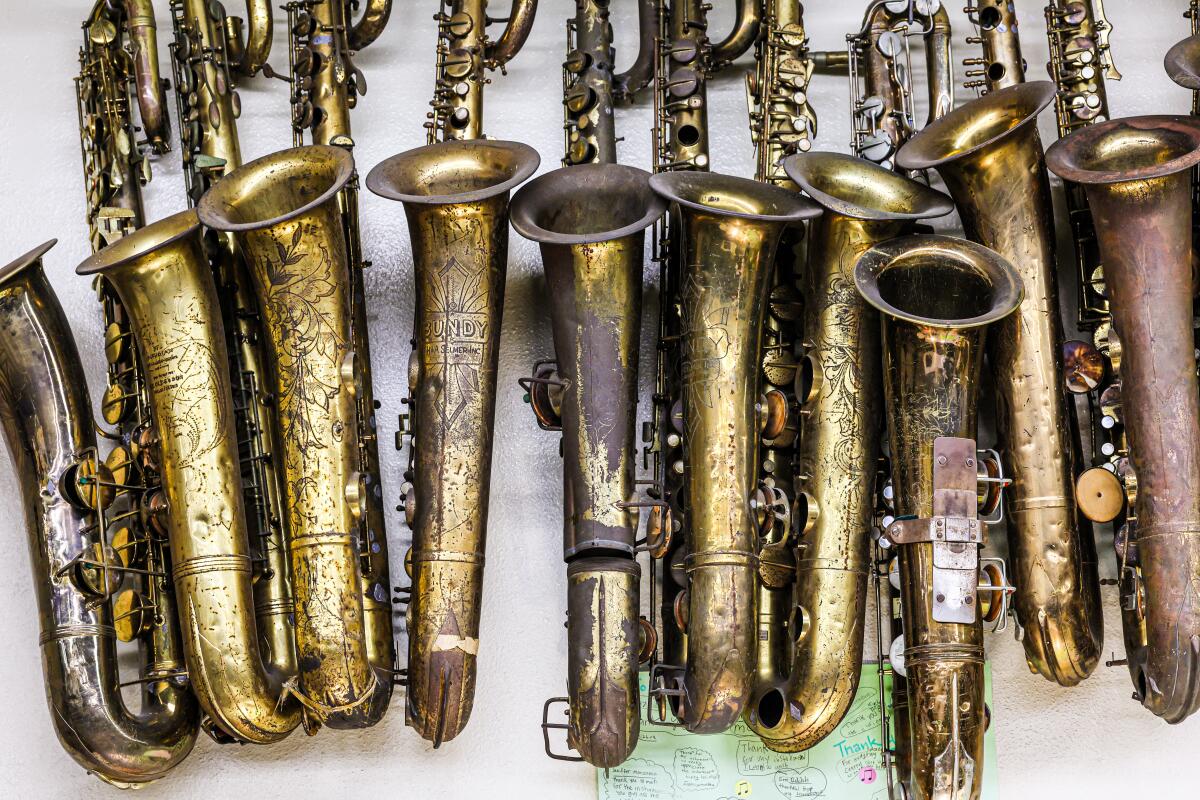 Weary-looking brass instruments are among the tens of thousands successful the LAUSD's instrumentality repair shop.