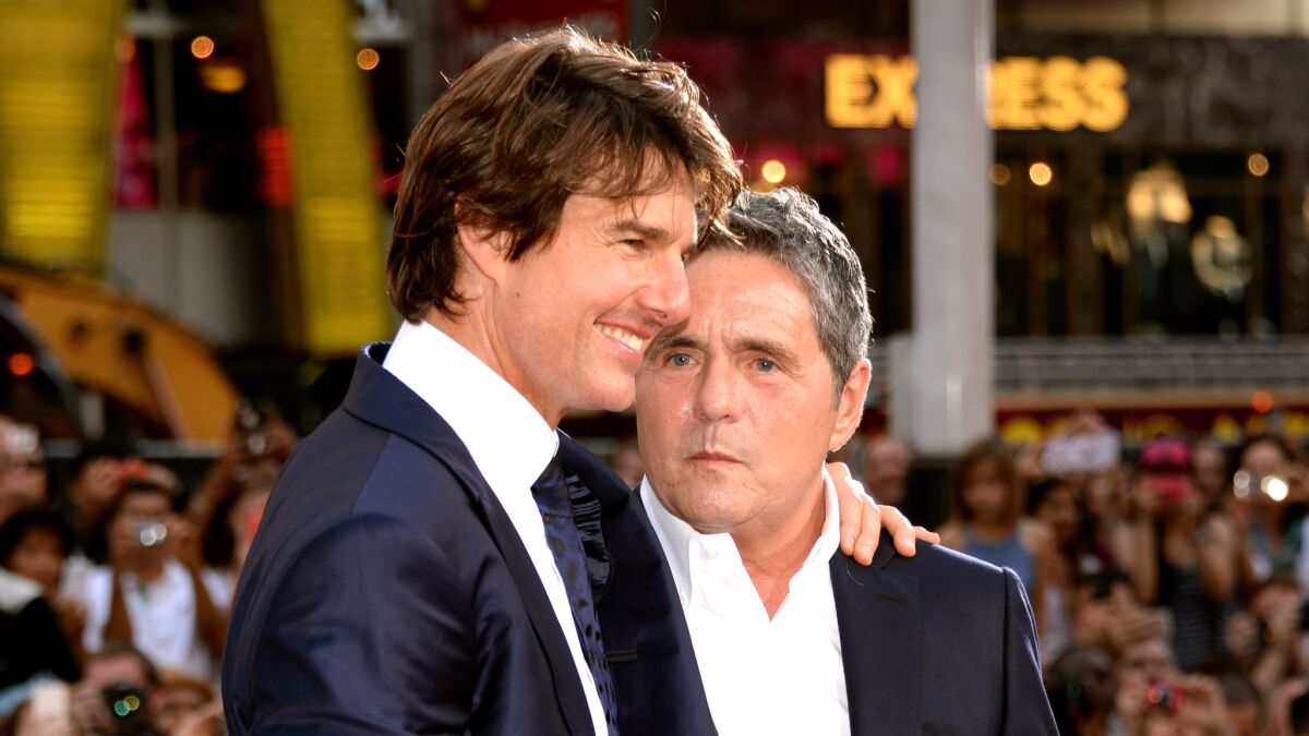 Tom Cruise and Brad Grey attend the New York premiere of "Mission Impossible: Rogue Nation" at Times Square on July 27, 2015.