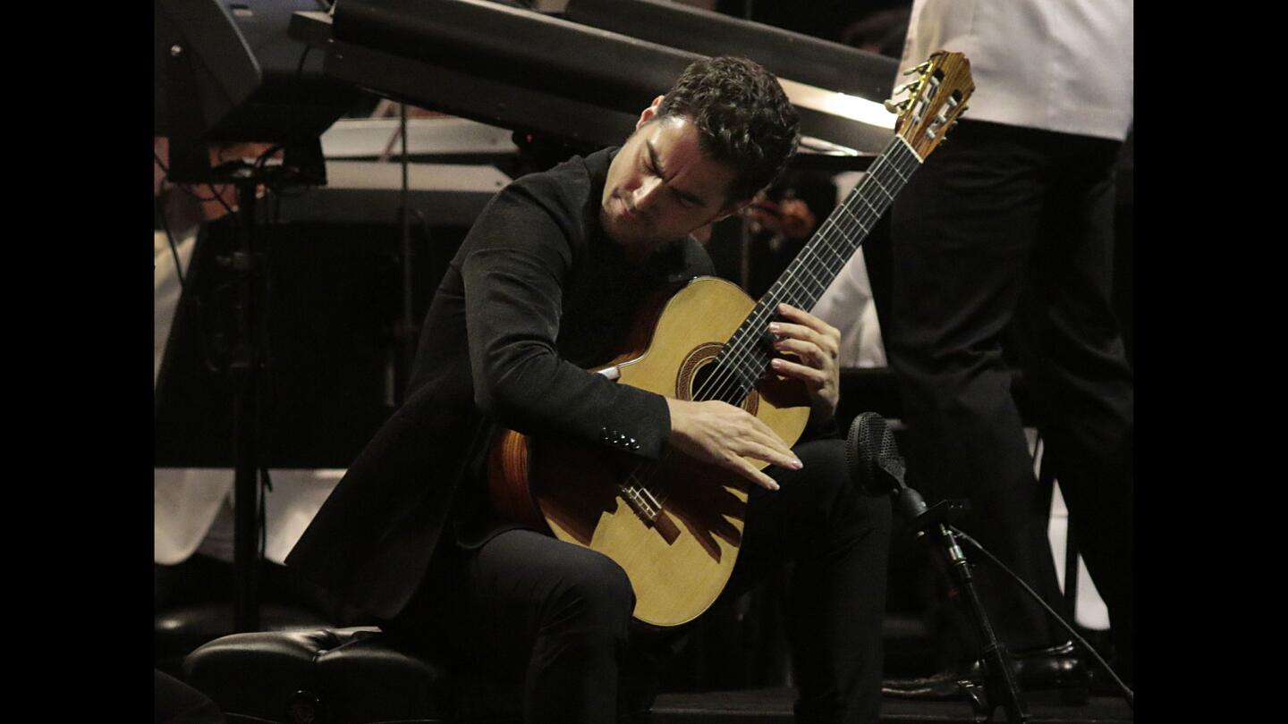 Guitarist Milos Karadaglic has his L.A. Philharmonic debut at the Hollywood Bowl in a performance that matched him with trumpet soloist Alison Balsom.