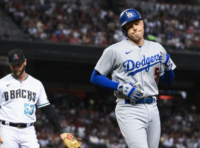 Dodgers star Freddie Freeman reacts after an out in Game 3 against the Diamondbacks.