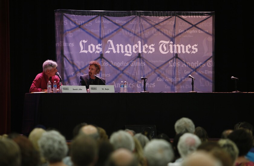 T.C. Boyle, author of "The Harder They Come," right, in conversation with Times book critic David L. Ulin at the Los Angeles Times Festival of Books at USC.