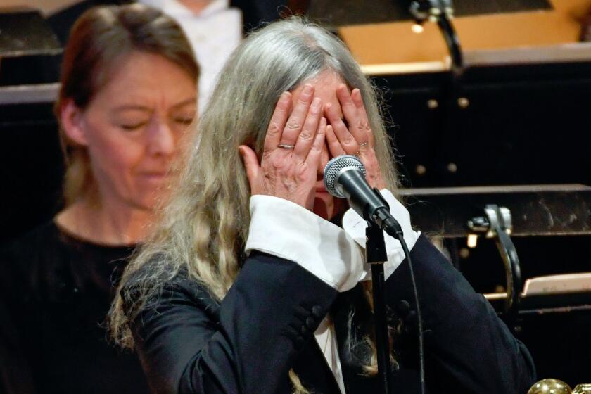 Patti Smith performing 'A Hard Rain's A-Gonna Fall' by absent 2016 Nobel literature laureate Bob Dylan during the 2016 Nobel Prize ceremony.