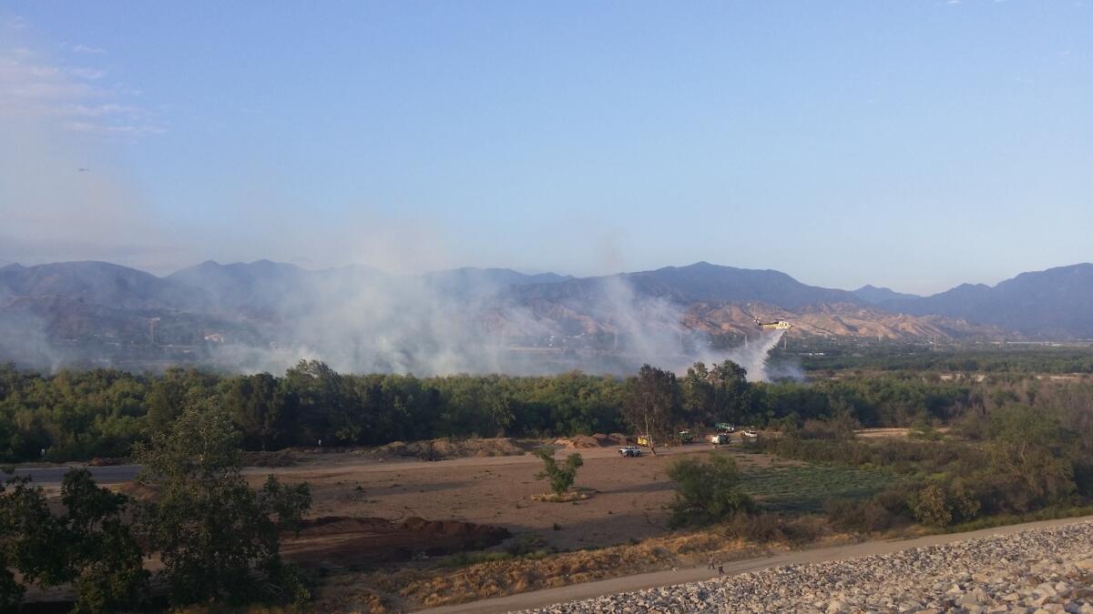A brush fire broke out near Hansen Dam in Pacoima.
