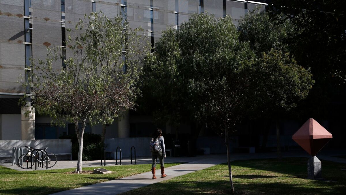 A student walks on the campus of Santa Monica City College.