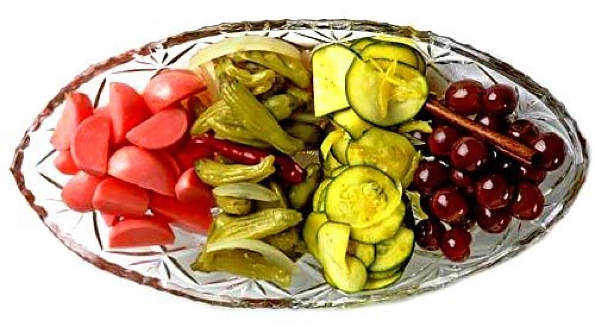 SPICY BITES: The relish tray includes pickled radishes, peppers, zucchini and grapes.