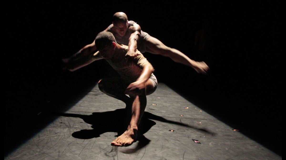 “Still,” a new dance by Rosanna Gamson for her World Wide company, is part of the opening program. Pictured: Jonathan Bryant, top, and Kearian Giertz.