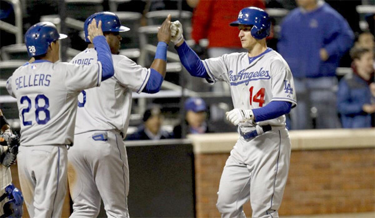 Mark Ellis had two home runs in the Dodgers' 7-2 victory over the New York Mets on Tuesday.
