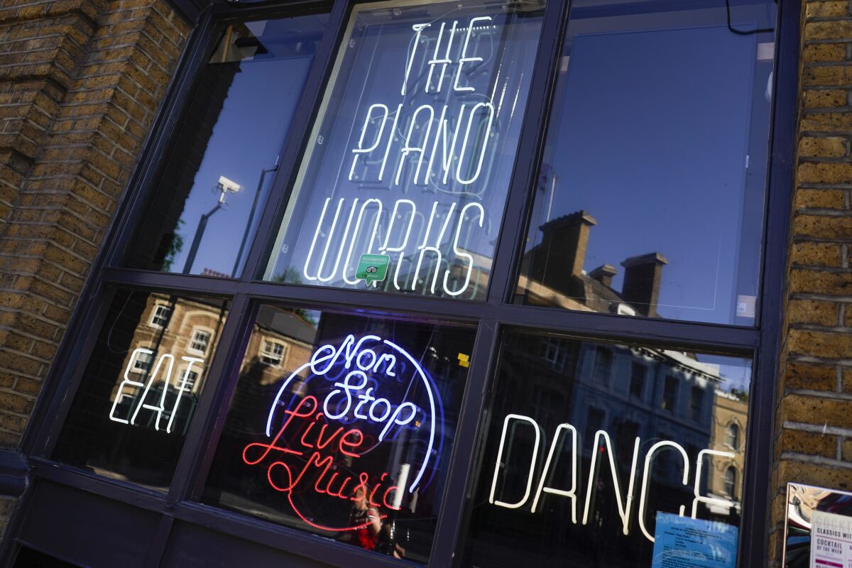 The Piano Works club in Farringdon, London, Friday, July 16, 2021, ahead of the reopening of nightclubs, as part of the relaxation of COVID-19 restrictions. Thousands of young people plan to dance the night away at “Freedom Day” parties as the clock strikes midnight Monday, when almost all coronavirus restrictions in England are due to be scrapped. Nightclubs can open fully and are not required to use vaccine passports. (AP Photo/Alberto Pezzali)
