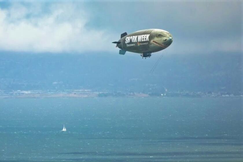 This shark blimp was photographed above San Diego but is expected to appear in San Diego from July 21-25, 2022.