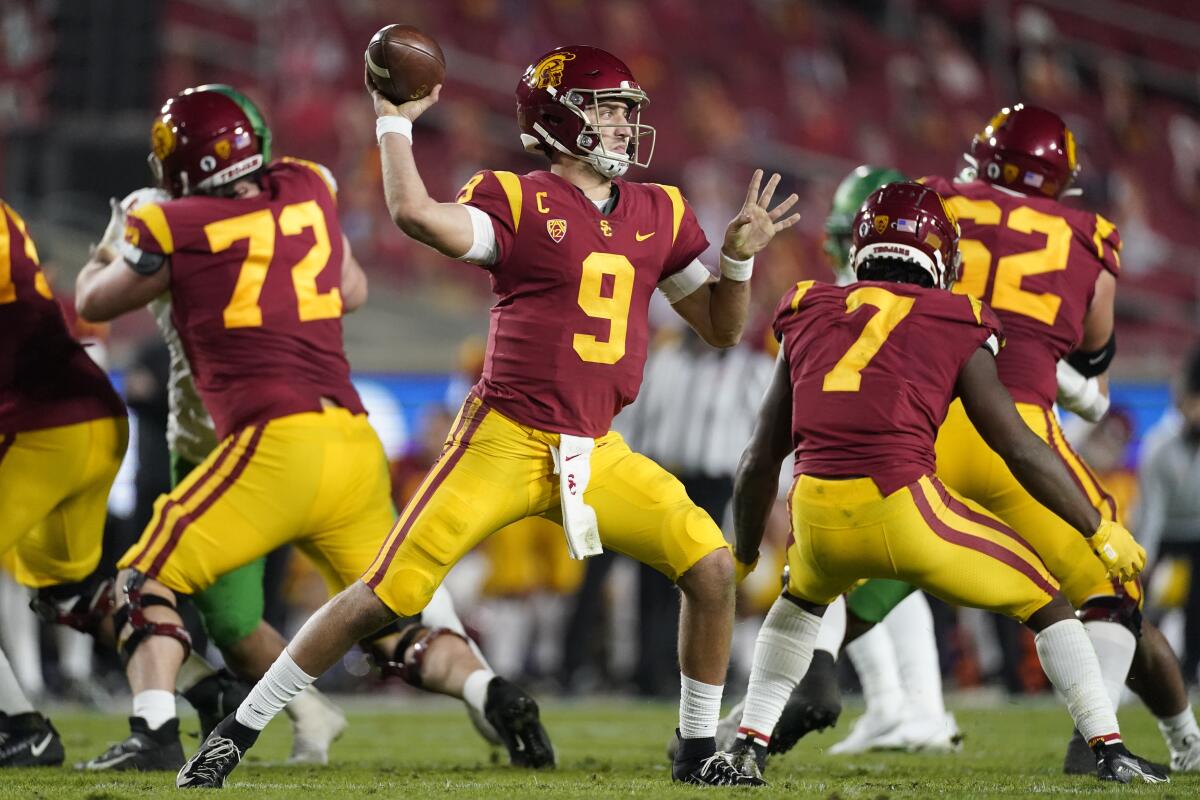FILE - In this Dec 18, 2020, file photo, Southern California quarterback Kedon Slovis (9) throws a pass during the second quarter of an NCAA college football Pac-12 Conference championship game in Los Angeles. About 16 starters return from last season's Pac-12 South champions, led by third-year starting quarterback Kedon Slovis with USC's usual wealth of skill-position talent around him. (AP Photo/Ashley Landis, File)