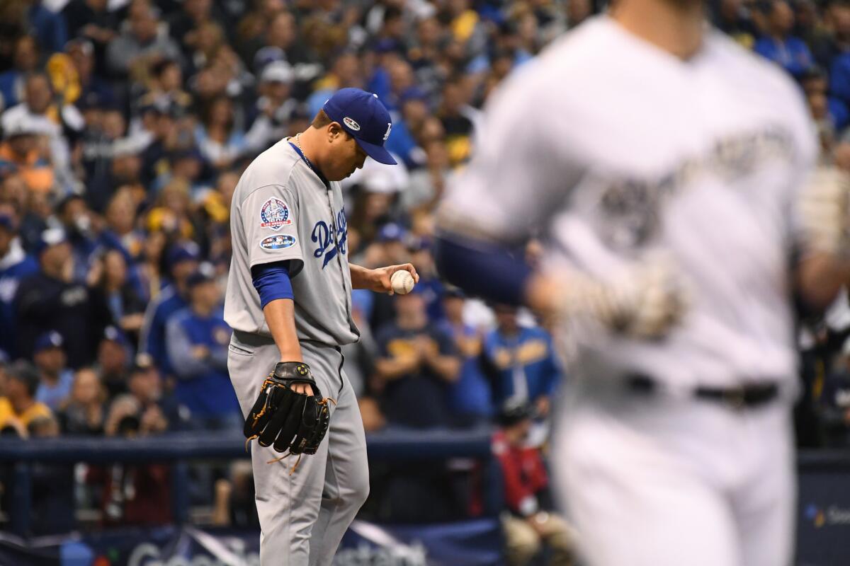 Dodger pitcher Hyun-Jin Ryu is rocked in the first inning.