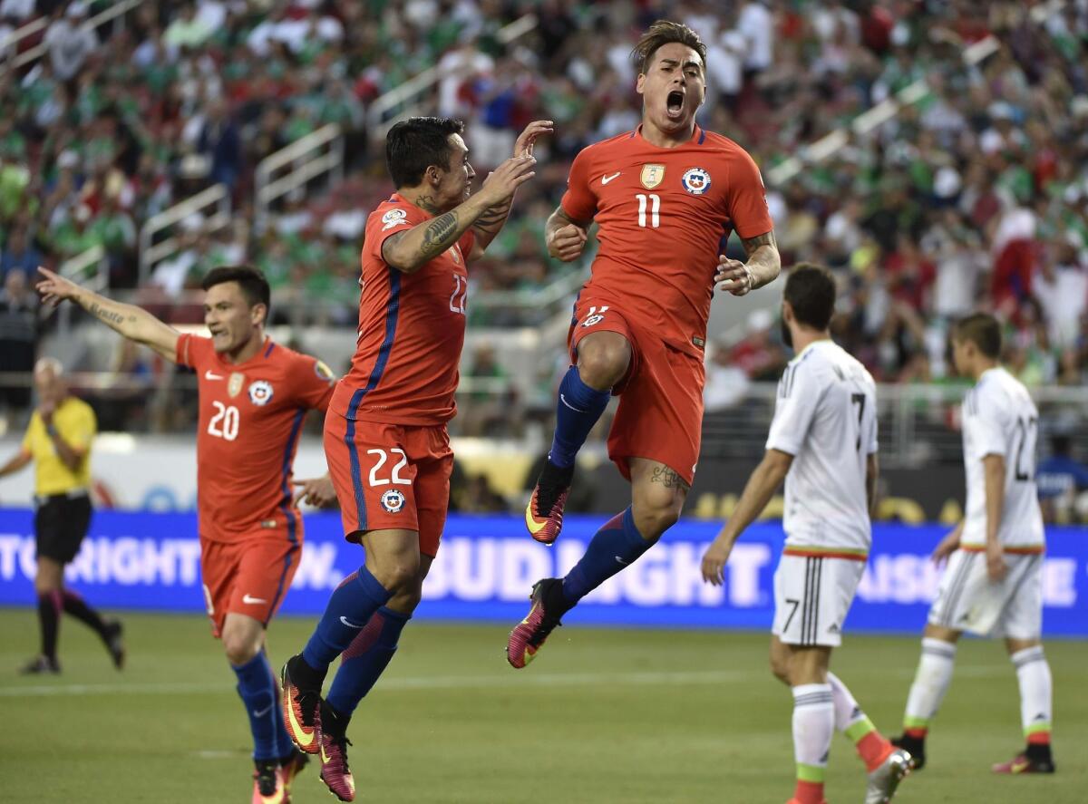 Chile's Eduardo Vargas (C) celebrates after scoring against Mexico during the Copa America Centenario quarterfinal football match in Santa Clara, California, United States, on June 18, 2016.