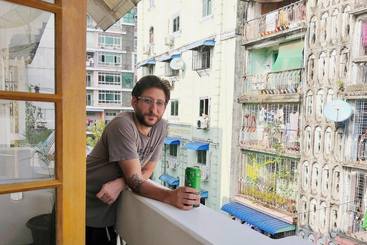 Danny Fenster relaxes on a balcony in Yangon.