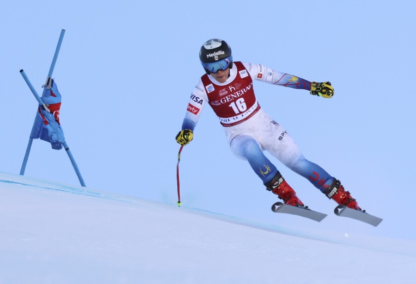 United States' Breezy Johnson speeds down the course during an alpine ski, women's World Cup super-G race in Val D'Isere, France, Sunday, Dec. 19, 2021. (AP Photo/Marco Trovati)
