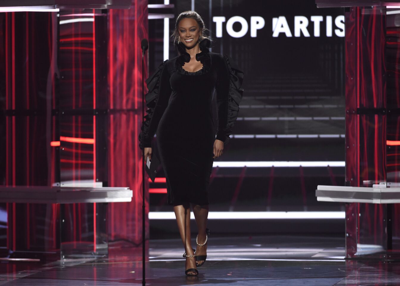 Tyra Banks walks out to present the top artist award at the Billboard Music Awards at the MGM Grand Garden Arena. (Ed Sheeran won.)