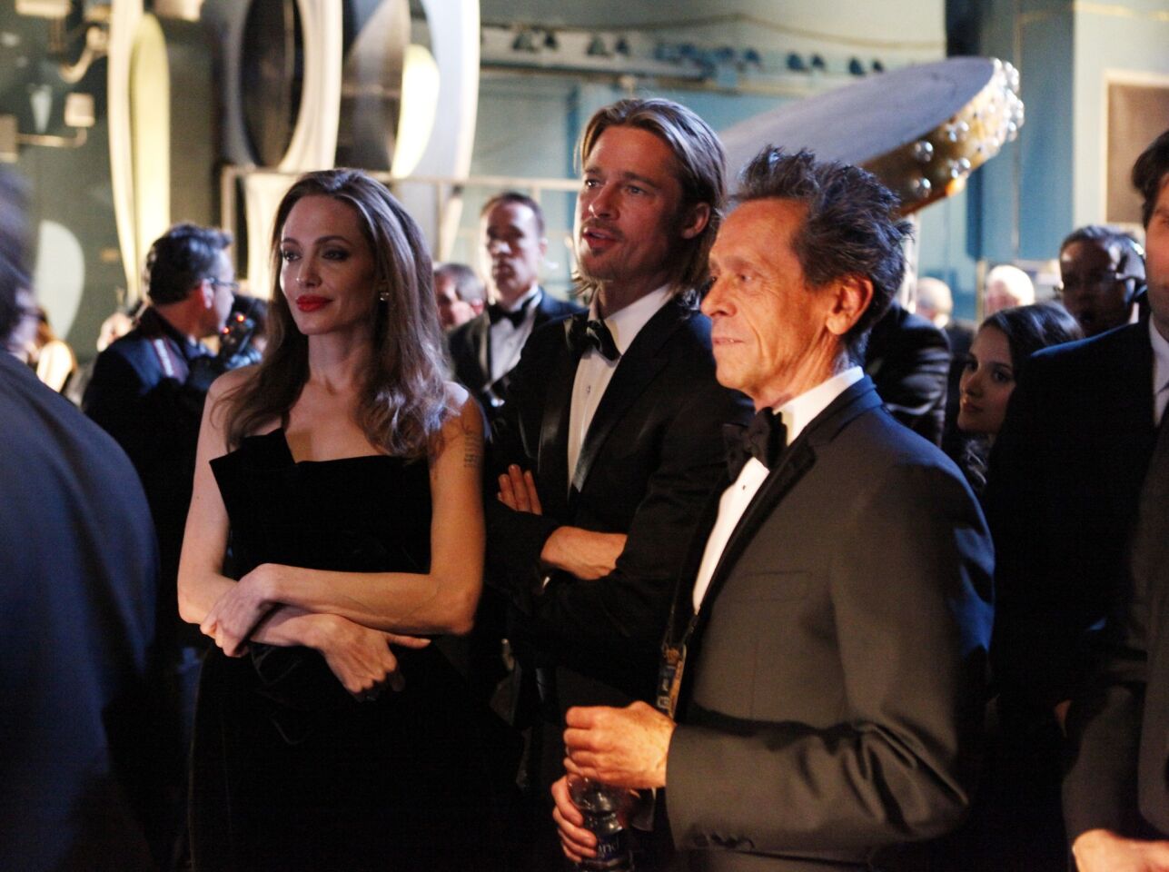 Angelina Jolie, Brad Pitt and Brian Grazer at the 84th Annual Academy Awards show at the Hollywood and Highland Center in Los Angeles on Feb. 26, 2012.
