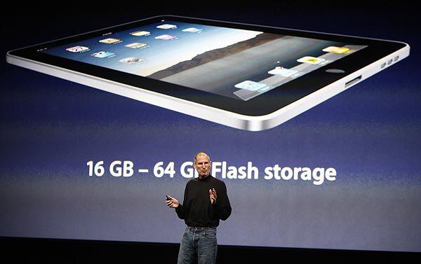 Apple CEO Steve Jobs introduces the new iPad during an event in San Francisco on Wednesday.
