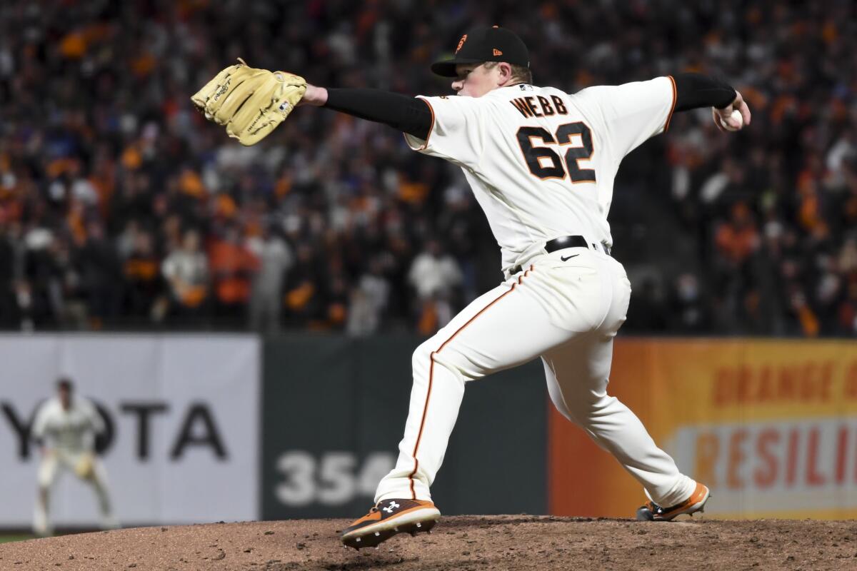 The Giants' Logan Webb pitches during the seventh inning against the Dodgers on Oct. 8, 2021.