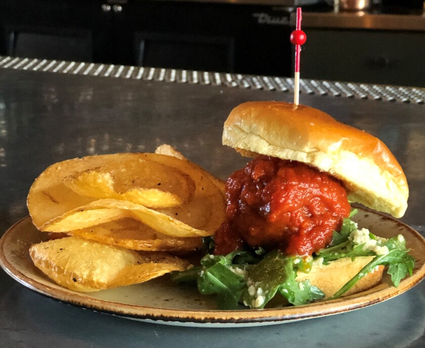 Bankers Hill Bar + Restaurant's happy hour on Mondays features $5 meatball sliders with roasted tomato sauce, grana Padano cheese and arugula, with a side of homemade chips.