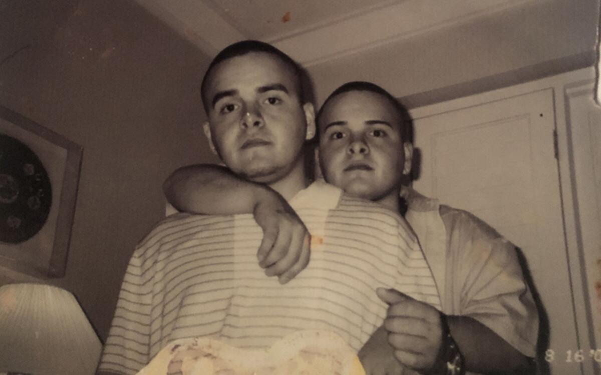 black and white photo of twin brothers