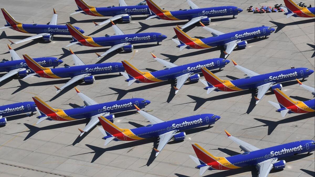 Southwest Airlines Boeing 737 MAX aircraft are parked on the tarmac at the Southern California Logistics Airport in Victorville.