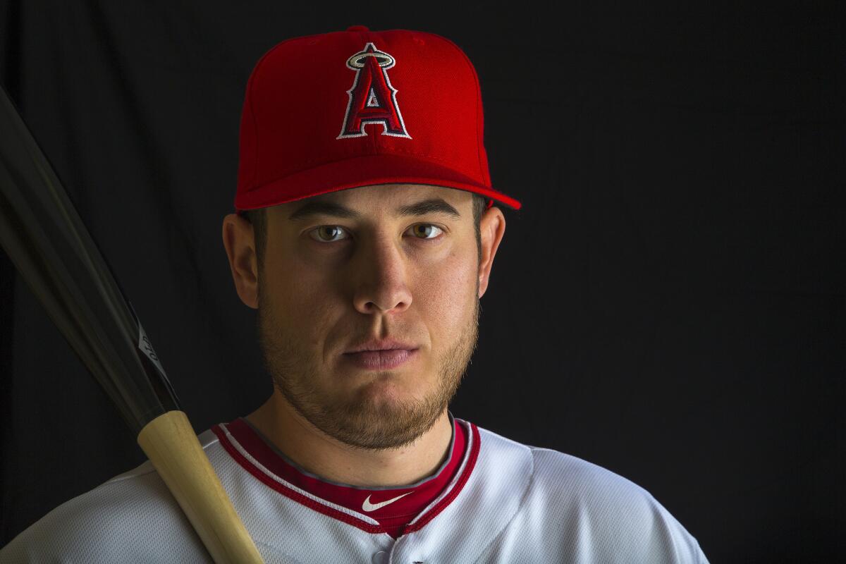 Angels infielder C.J. Cron poses for a puctyre during the team's photo day at spring training on Feb. 26.