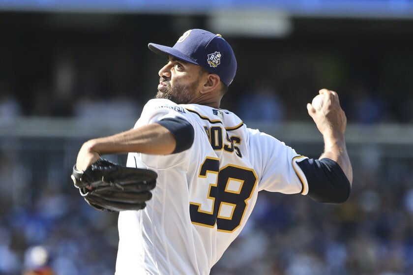 San Diego Padres starting pitcher Tyson Ross throws against Los Angeles Dodgers' batter Chase Utley during the first inning of a baseball game Monday, April 4, 2016, in San Diego. (AP Photo/Lenny Ignelzi)
