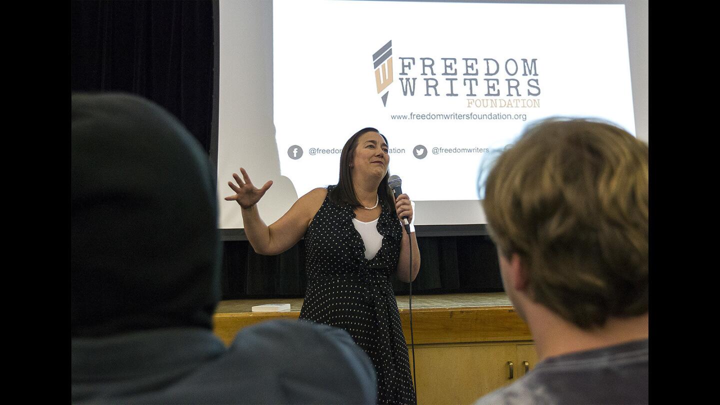Erin Gruwell, educator and author of “Freedom Writers,” speaks to Back Bay High School students and faculty on Friday, December 8.