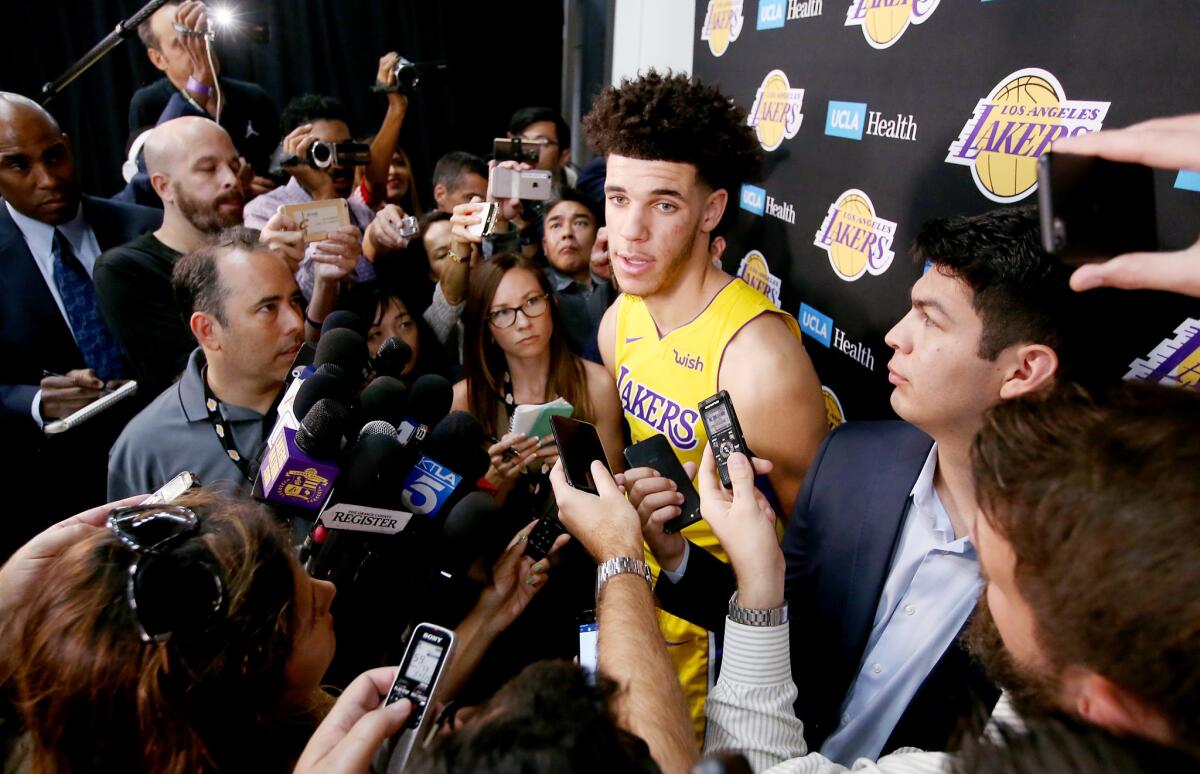 Lakers point guard Lonzo Ball talks with reporters during media day activities at the team's training facility in El Segundo on Sept. 25.