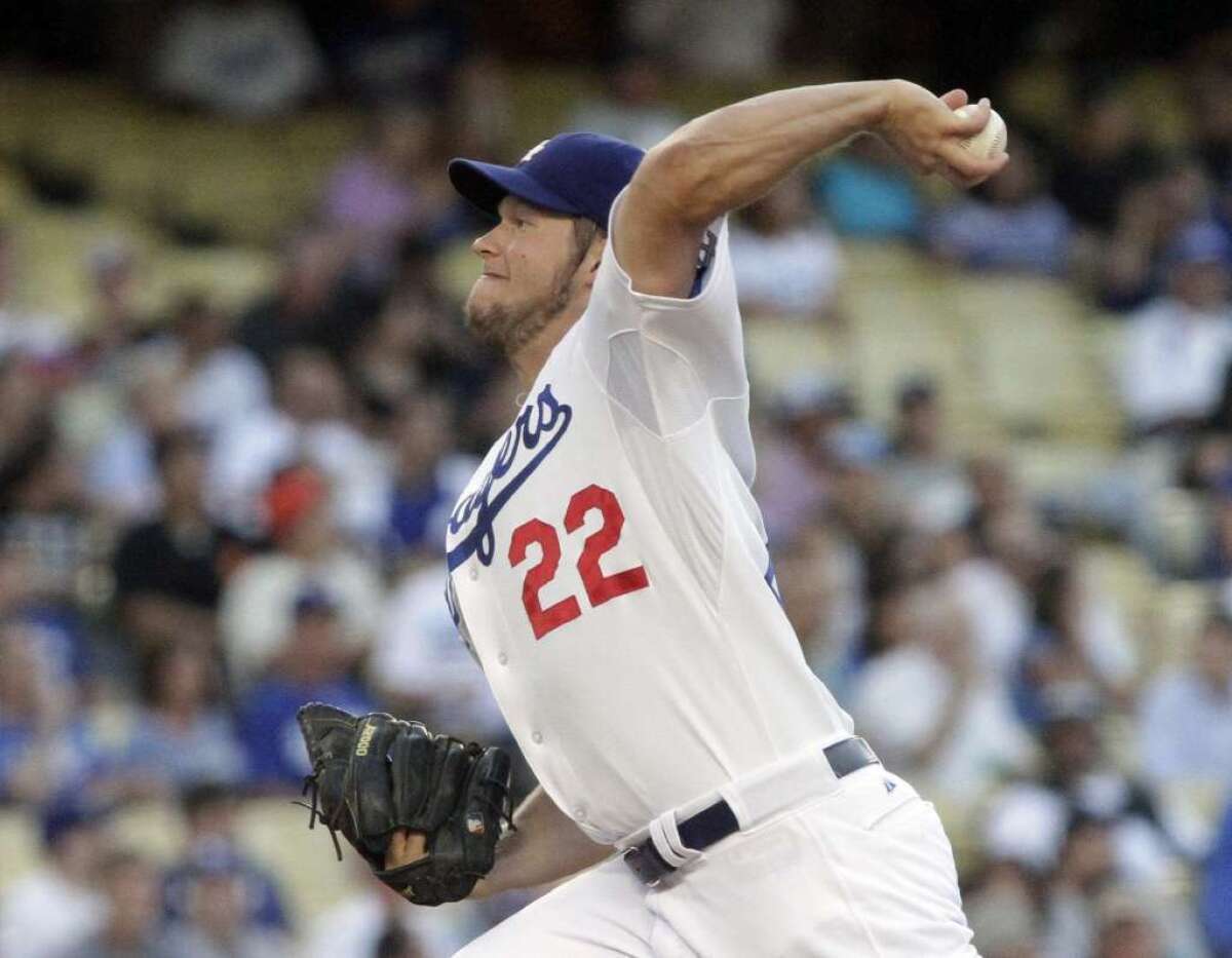 Clayton Kershaw was named NL pitcher of the year in a vote by his fellow major leaguers.