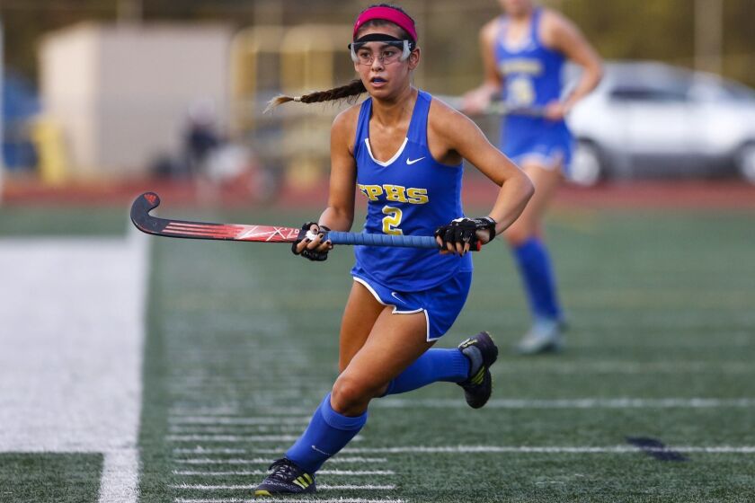 SAN DIEGO, November 18th, 2017 | Serra Conquistadors vs San Pasqual Golden Eagles Open Division high school field hockey championship on Saturday, Nov. 18, 2017 at Serra High School. San Pasqual's Keeley Akagi chases a shot down the sideline in the second half against Serra. Photo by Chadd Cady