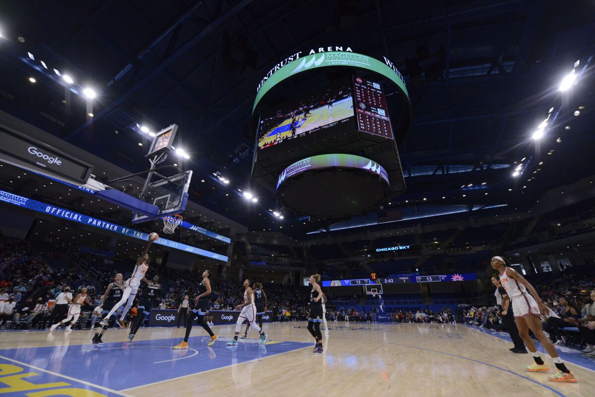 Connecticut Sun's DeWanna Bonner (24) goes up to shoot during the first half of Game 3 of a WNBA semifinal playoff basketball game against the Chicago Sky, Sunday, Oct. 3, 2021, in Chicago. (AP Photo/Paul Beaty)