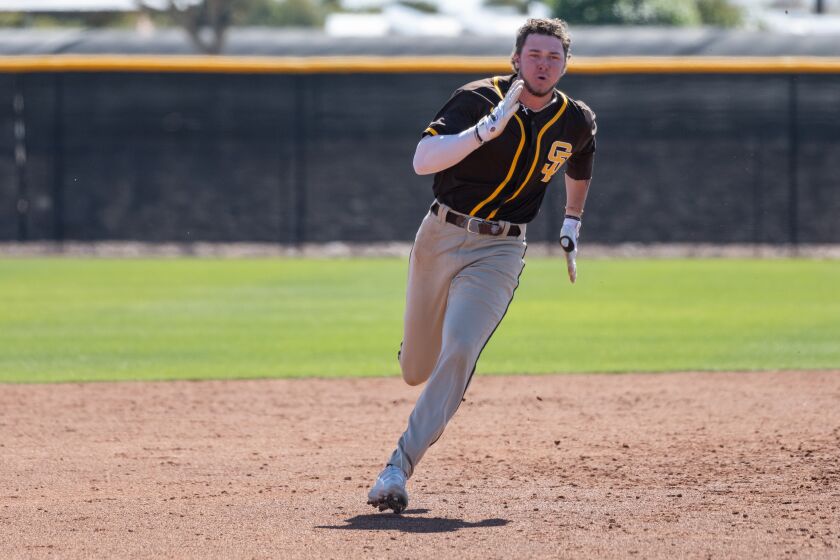 Jackson Merrill (1) rounds third at Peoria Sports Complex in spring training.