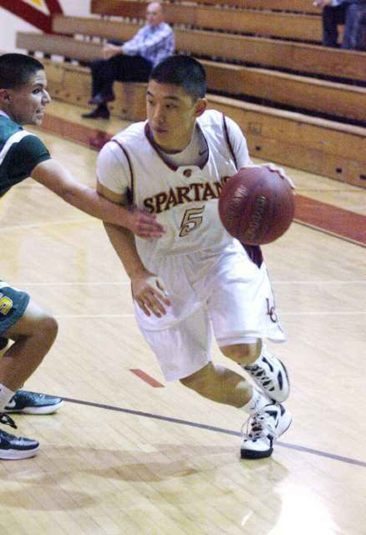 ARCHIVE PHOTO: La Canada's senior point guard Ryan Lee is one of two returning starters for the Spartans.