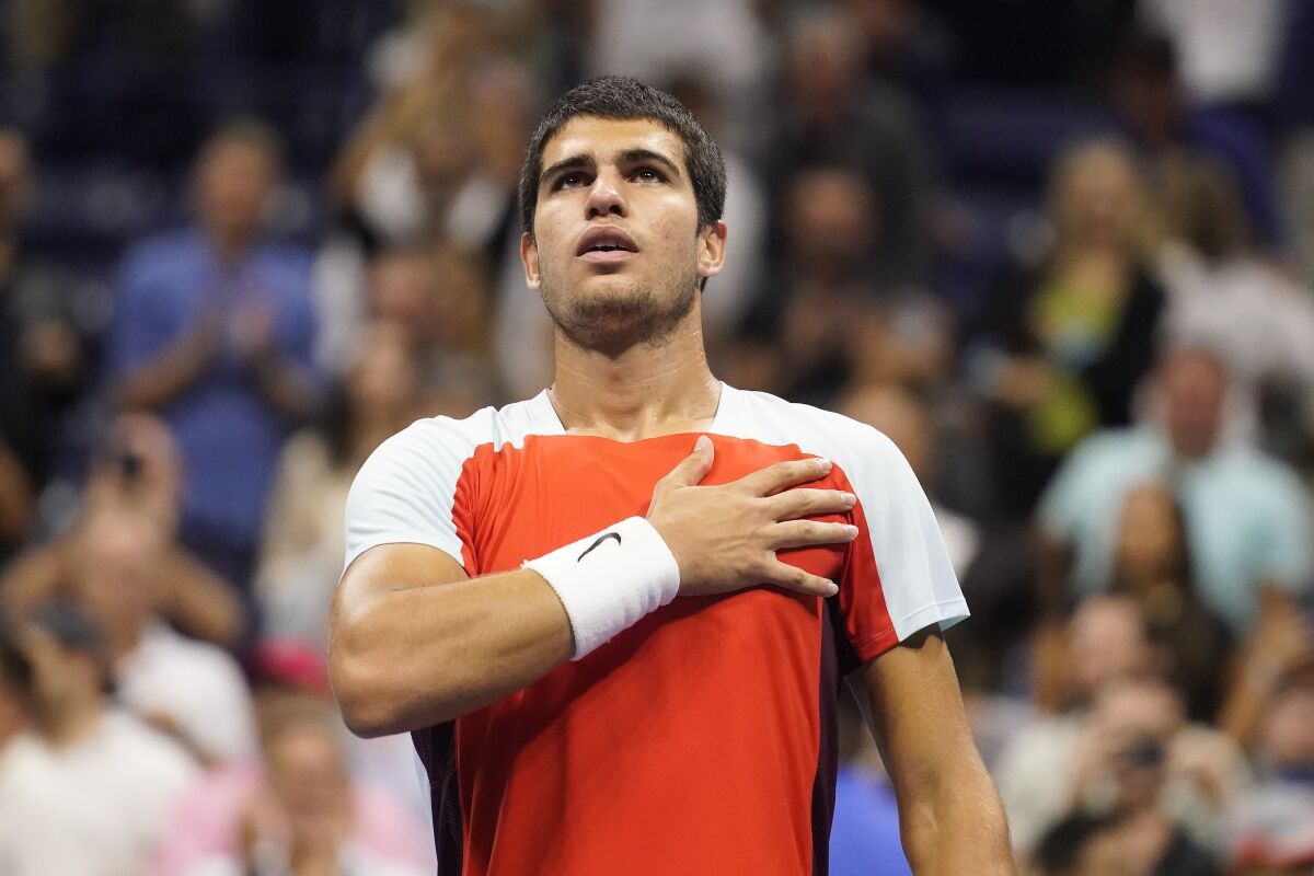Carlos Alcaraz acknowledges the crowd after defeating Frances Tiafoe in a U.S. Open semifinal Sept. 9, 2022.