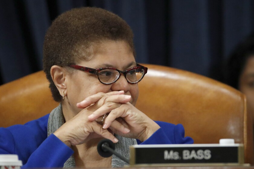 FILE - Dec. 12, 2019, file photo Rep. Karen Bass, D-Calif., listens during a House Judiciary Committee markup of the articles of impeachment against President Donald Trump, on Capitol Hill in Washington. California Congresswoman Bass has emerged a leading contender to be Democrats' vice presidential candidate. Allies say her reputation as a bridge-builder would make her a strong partner to presumptive Democratic presidential nominee. (AP Photo/Alex Brandon, File)
