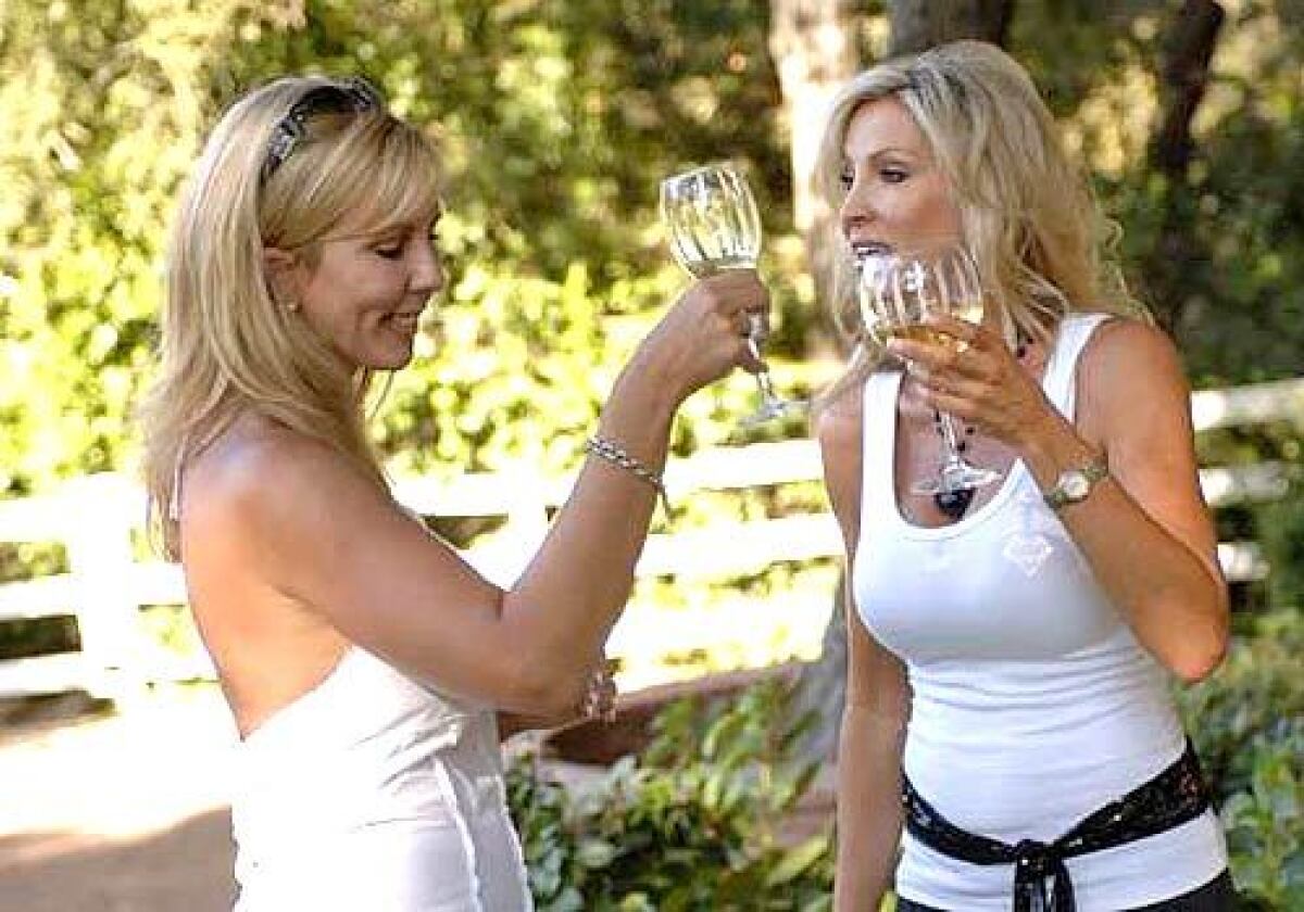 Vicki Gunvalson, left, and Lauri Peterson on "Real Housewives of Orange County."