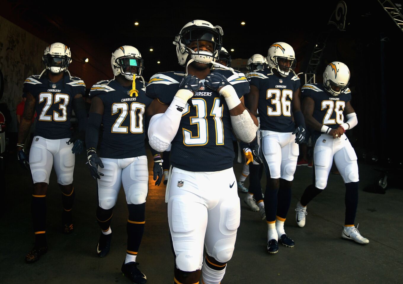 LOS ANGELES, CA - SEPTEMBER 23: Adrian Phillips #31 of the Los Angeles Chargers stands with his teammates before taking the field to warm up prior to the start of the game against the Los Angeles Rams at Los Angeles Memorial Coliseum on September 23, 2018 in Los Angeles, California.