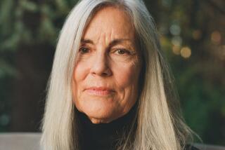 A woman with long, gray hair in a black turtleneck sitting on a white bench.