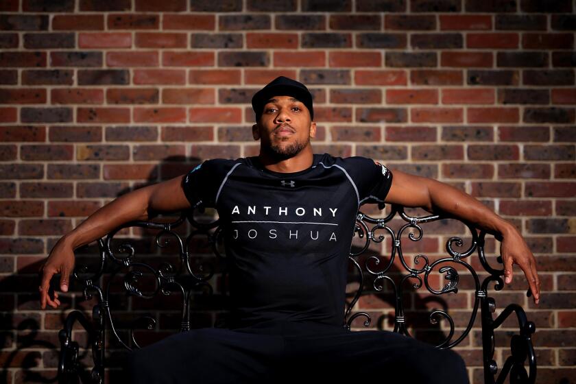 Anthony Joshua attends a news conference in London on Wednesday for his upcoming bout against Dominic Breazeale.